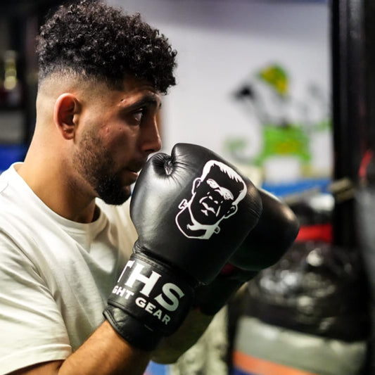 THS Fight Gear Muay Thai boxing gloves black full real leather modelled side view