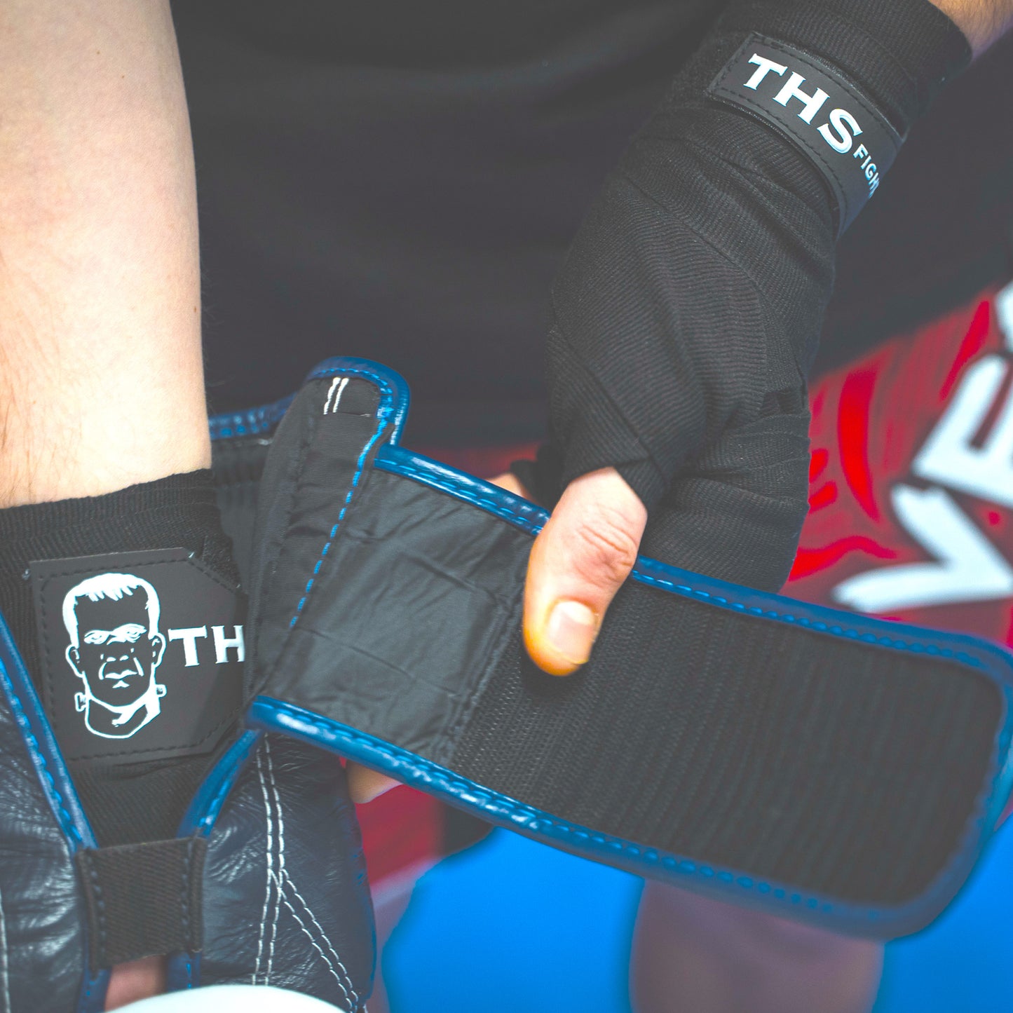 THS Fight Gear black hand wraps hands wrapped putting on glove modelled
