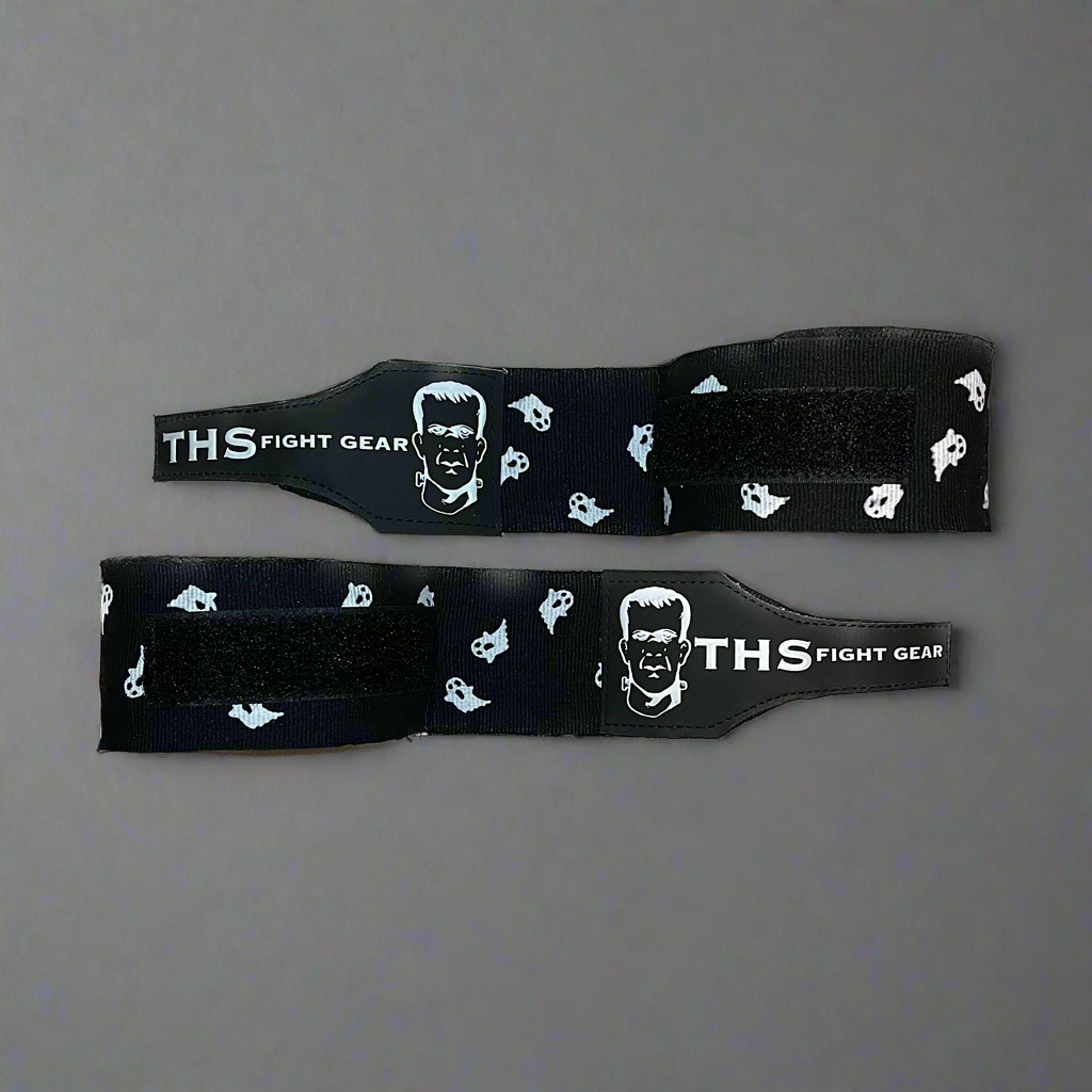 THS Fight Gear black with ghosts hand wraps two wraps half rolled front view display