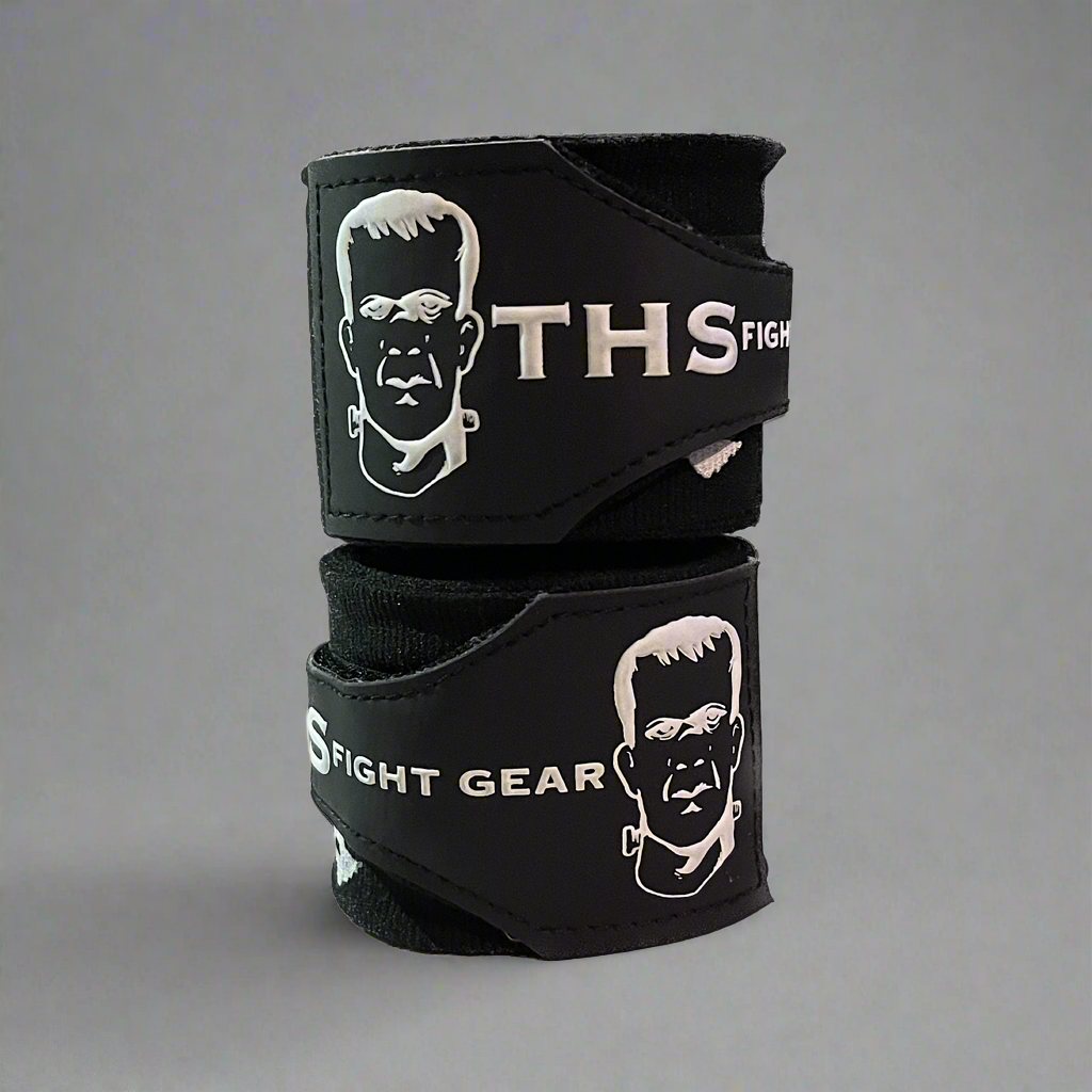 THS Fight Gear black with ghosts hand wraps two wraps rolled stacked front view display