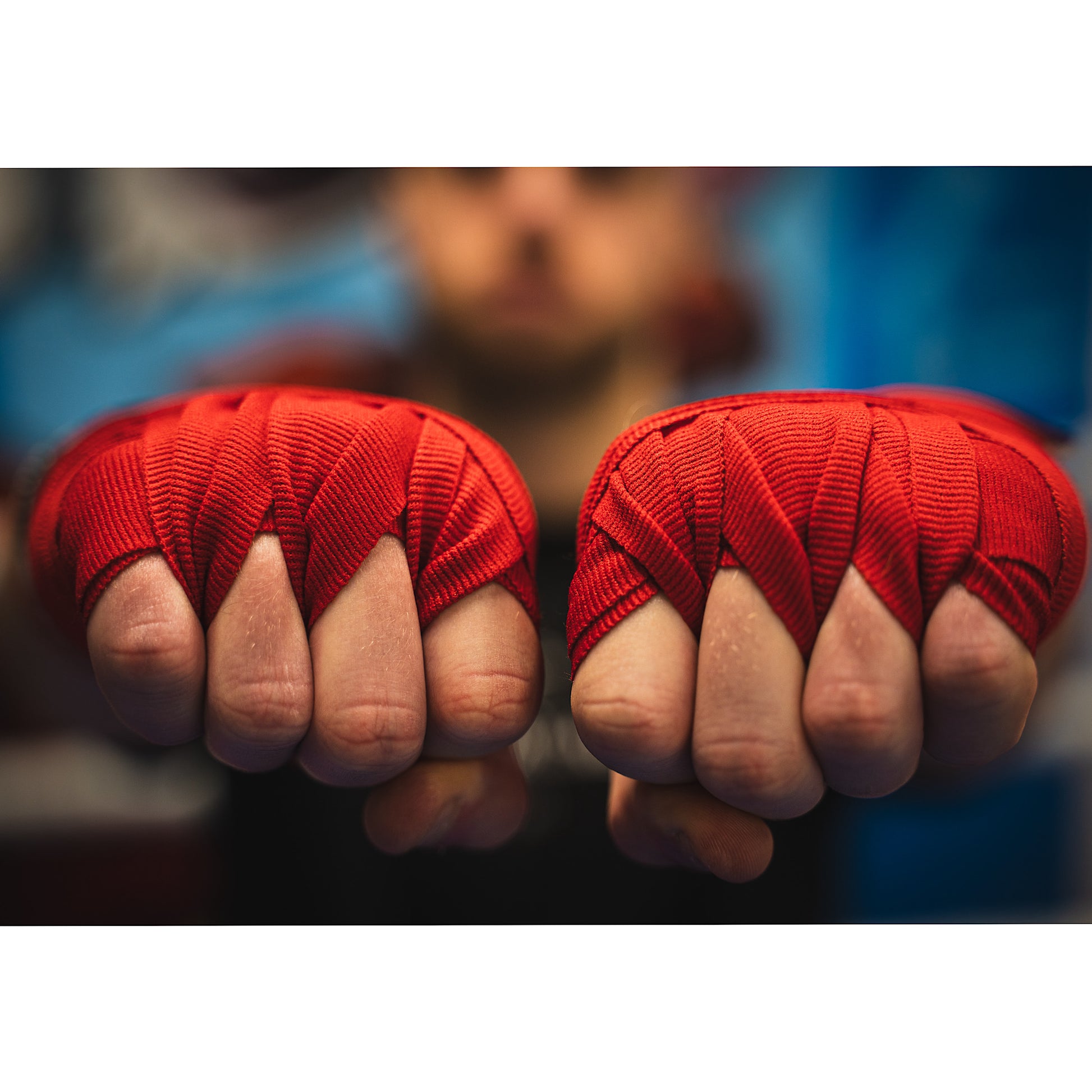 THS Fight Gear red hand wraps wrapped hands fists front view modelled
