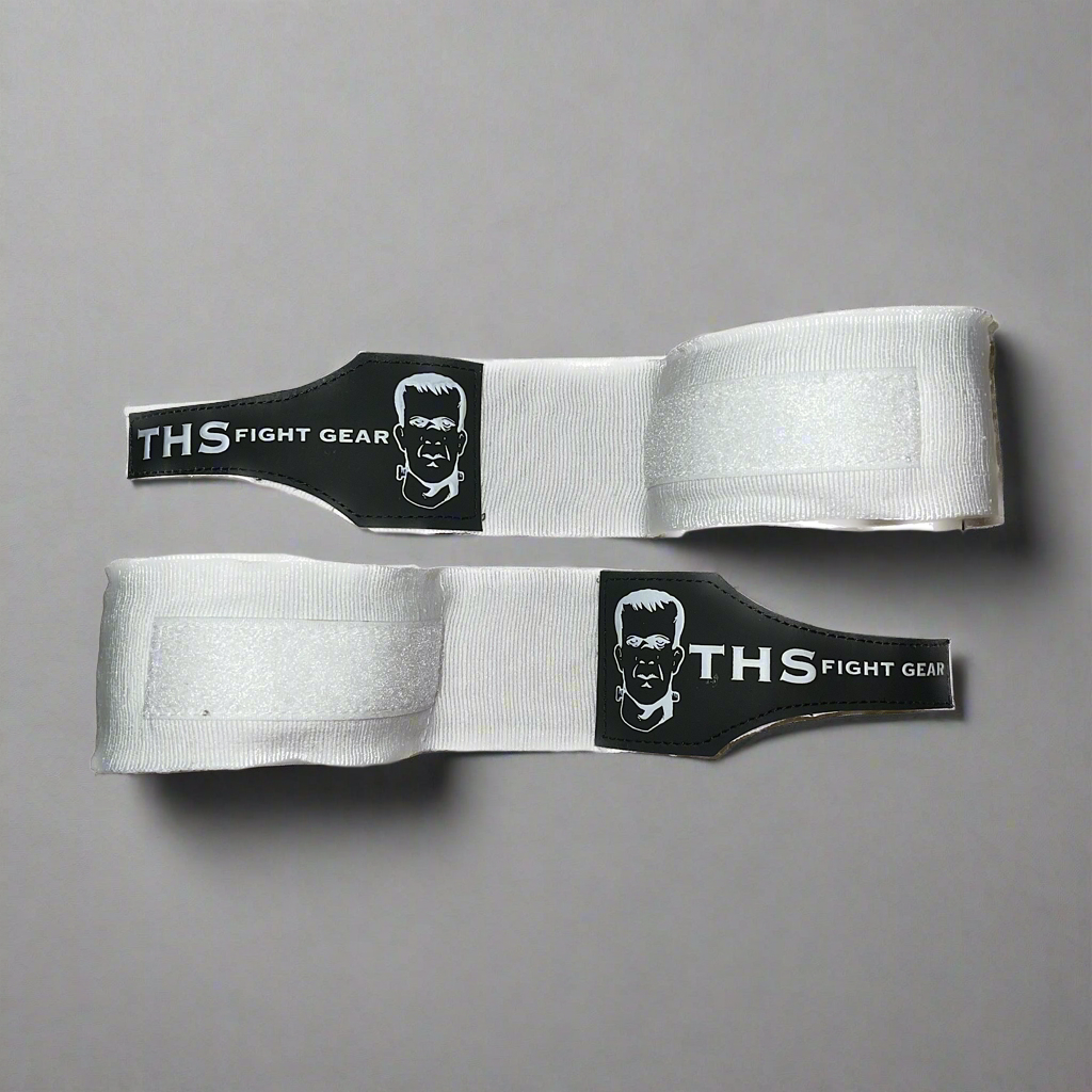 THS Fight Gear white hand wraps two wraps half rolled front view display