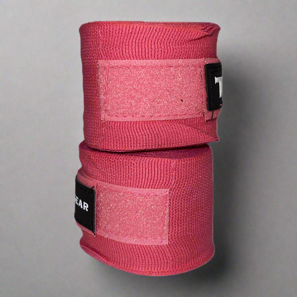 THS Fight Gear pink hand wraps rolled stacked view