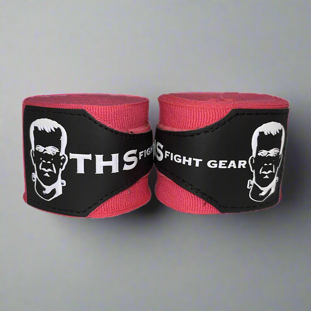 THS Fight Gear pink hand wraps rolled up front view