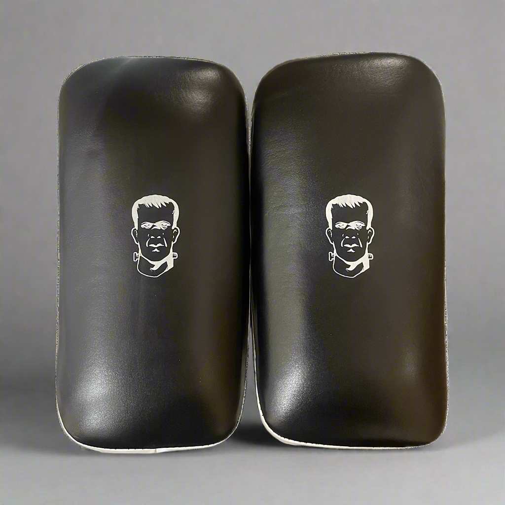 THS Fight Gear Thai kick pads with wrist cushion black full leather front view