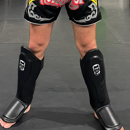 THS Fight Gear Muay Thai Shin Guards Black Full Real Leather Modelled Front View