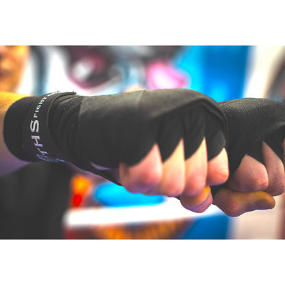 THS Fight Gear black hand wraps hands wrapped tight fists front right view modelled