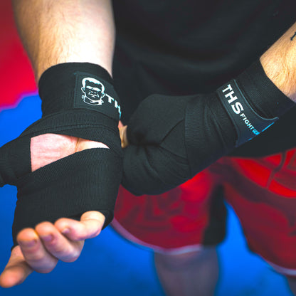 THS Fight Gear black hand wraps hands wrapped fighter stance under view modelled