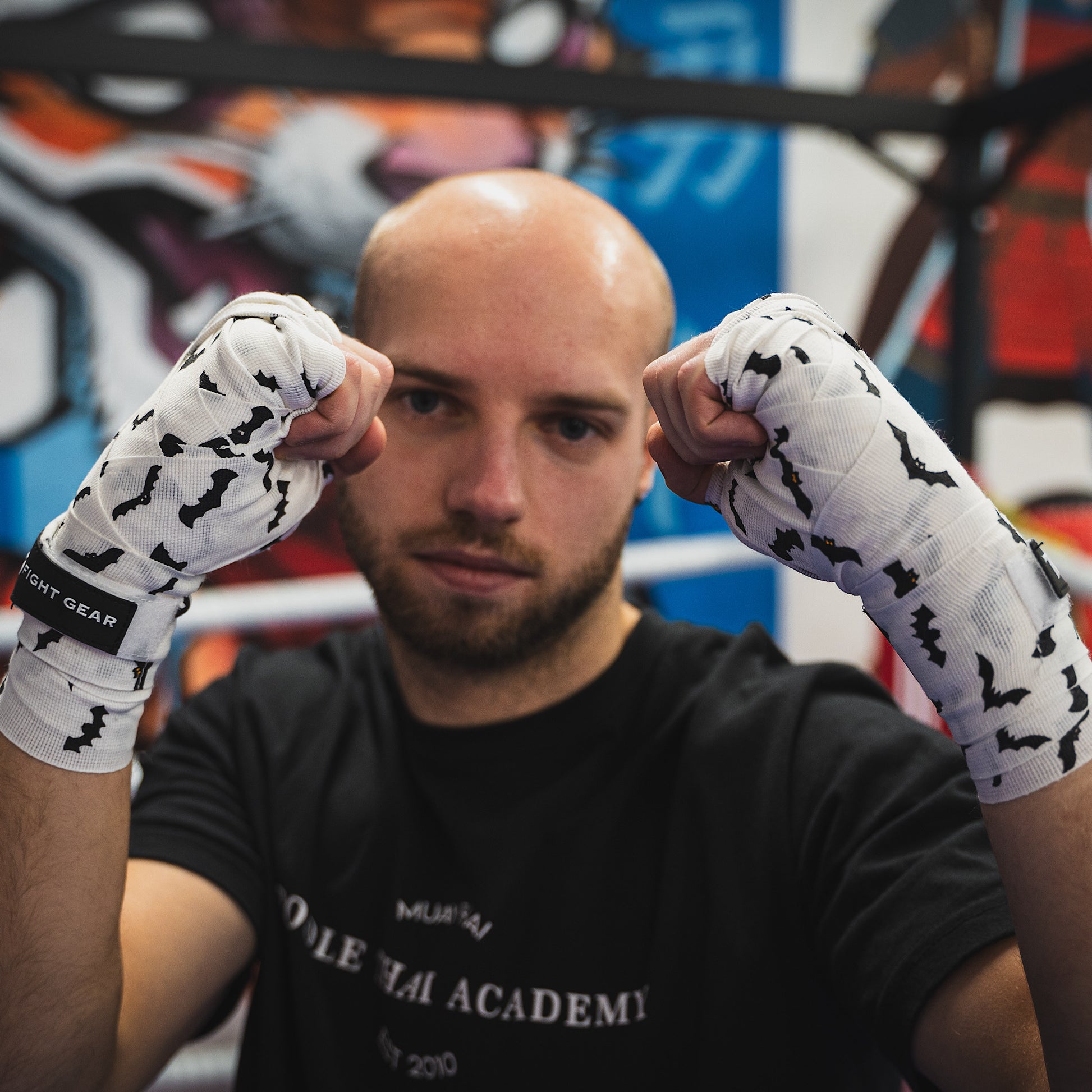 THS Fight Gear white with bats hand wraps wrapped hands fighter stance front view modelled